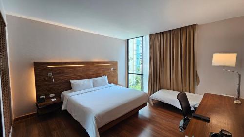 Lova arba lovos apgyvendinimo įstaigoje Sachas Hotel UNO Asoke Sukhumvit Bangkok
