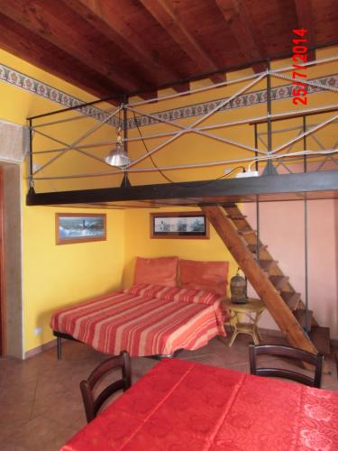 a bedroom with a bed in a room at Holiday home Santa Flavia in Santa Flavia
