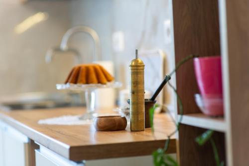a close up of a counter with a candle on it at Parkview Home in Korçë