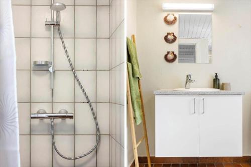 a bathroom with a shower and a sink at LF11979-Struer-Havstokken-9-a in Vemb