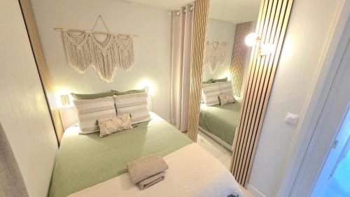 Appart cosy, 2 pièces, clim, parking privée, tout équipé, face au port de Santa Lucia