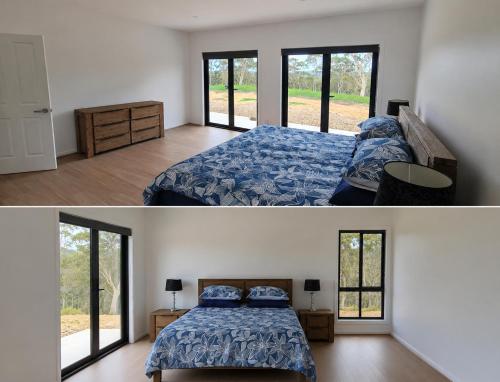a bedroom with a bed and a room with windows at Redhill Batemans Bay in Batemans Bay
