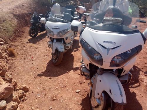 two motorcycles are parked on a dirt road at Magic View in Bine el Ouidane