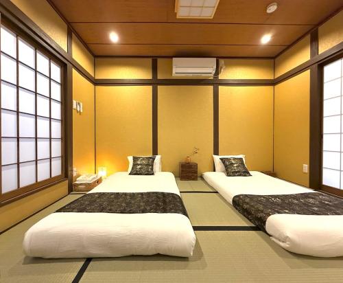 贅沢な枯山水庭園付き一棟貸し町家 岸里駅徒歩4分 なんば5分 関空直通 3寝室 トイレ2 6名 洗濯乾燥機付