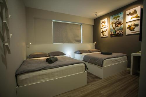 Postel nebo postele na pokoji v ubytování Hollywood Hotel