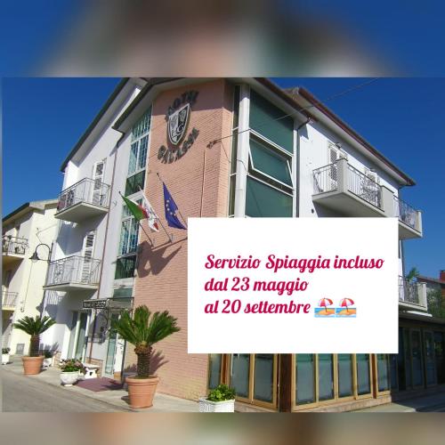 a building with a sign in front of it at Hotel Galassi in Numana