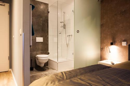 Kylpyhuone majoituspaikassa Hotel Nacht-Quartier