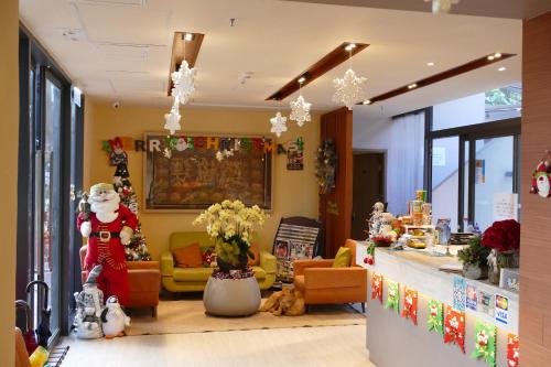 a store with christmas decorations on the walls at Seaview Holiday Resort in Hong Kong