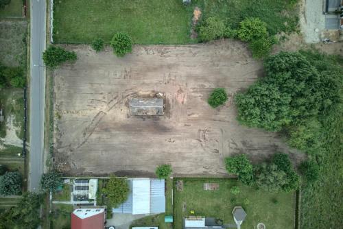 an aerial view of a yard with a tree at Gortatowo Natura 2000 in Gortatowo