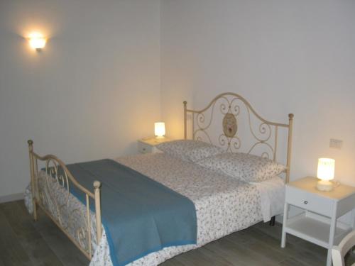 A bed or beds in a room at Agriturismo Alto Venda