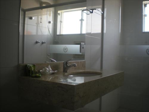 Ένα μπάνιο στο Hotel Villaggio Nobre