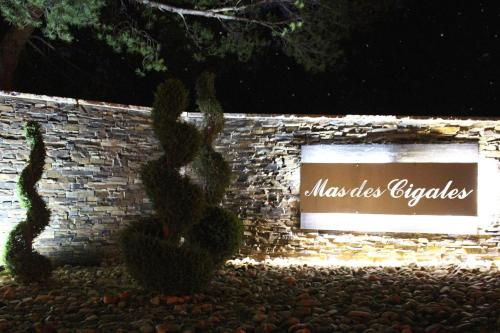 a sign that reads massachusetts cactus in front of a building at Mas des Cigales in Eygalières