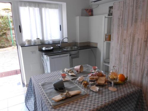 Kuchyň nebo kuchyňský kout v ubytování Casa Marinella