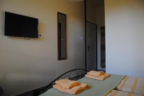 A bed or beds in a room at Villa Hedi