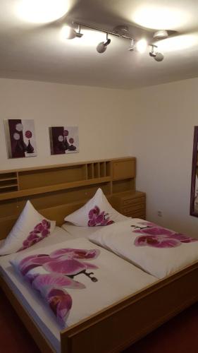 Postel nebo postele na pokoji v ubytování Hotel Pension Fernblick