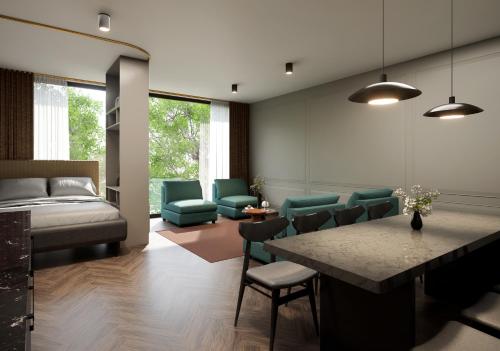 a living room with a couch and a table and chairs at Apartmenthaus Berlin Mitte in Berlin