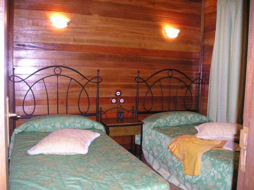 Krevet ili kreveti u jedinici u objektu Cabañas Valle Verde