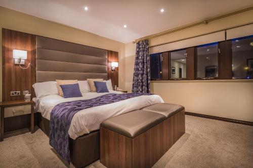 Cama o camas de una habitación en The Old Bridge Inn, Holmfirth, West Yorkshire - The Coaching Inn Group