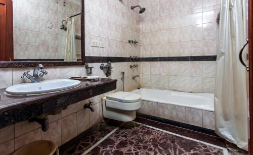 Koupelna v ubytování Hotel Sunstar Residency