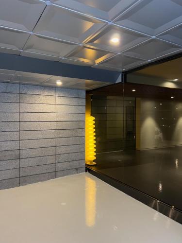 a room with a hallway with a ceiling at The hotel 1997 - 더호텔 1997 in Seoul