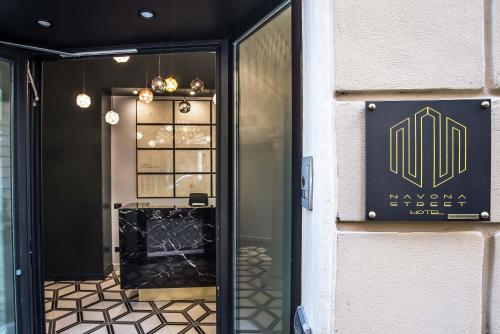 a window of a store with a sign on it at Navona Street Hotel in Rome