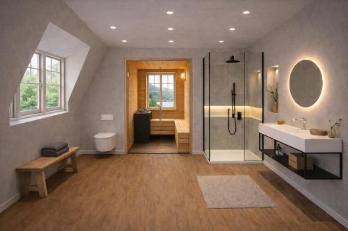 a bathroom with a shower and a sink and a toilet at Seehaeuser am Lindenhof in Lychen