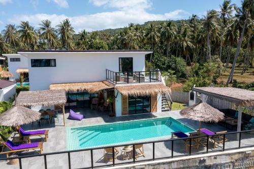an aerial view of a villa with a swimming pool at Manao Seaview Pool Villa 33 - 5 Mins Walk To The Beach in Ko Lanta