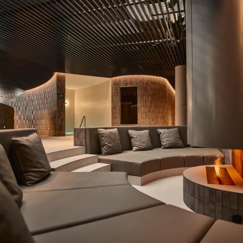 a living room with couches and a table at Jack House in Mostec