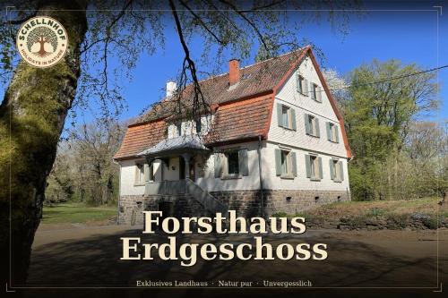 a book cover of a house with the words forests appliances appliancesclerosis at Schellnhof Forsthaus am Waldrand in Nidda
