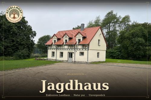 a magazine advertisement for a house with a red roof at Schellnhof Forsthaus am Waldrand in Nidda