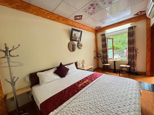 a bedroom with a large bed in a room at Tam Coc Thanh Dat Homestay in Ninh Binh
