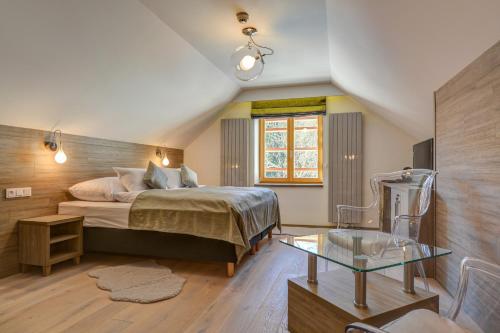Postel nebo postele na pokoji v ubytování Amenity Hotel & Resort Špindlerův Mlýn