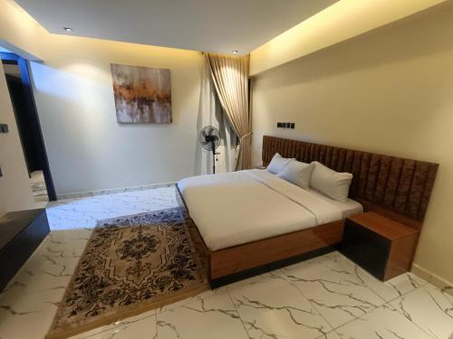 a bedroom with a bed in a room at House 234 in Ungwan Bado