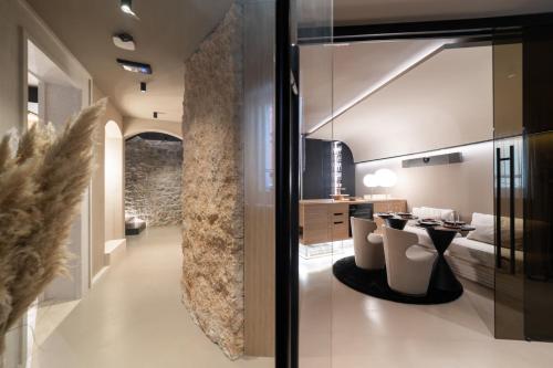 a bathroom with a row of toilets in a room at La Villa Residence in Rovinj