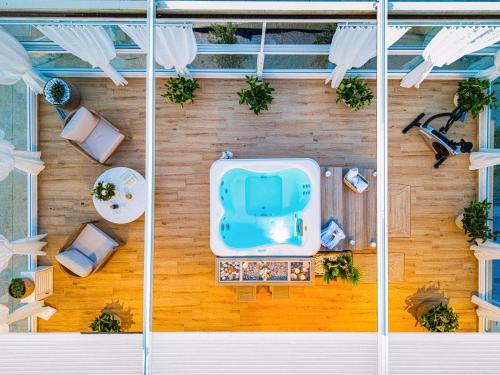 an overhead view of a patio with a swimming pool at Spartakos Villa Resort - Slow Living Retreat collections With Private Pools in Planos