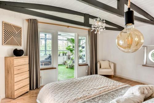 La Verrière - Maison atypique avec jardin d'hiver dans verrière d'époque