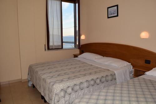 Hotel Hydra Clubにあるベッド