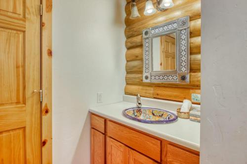 a bathroom with a sink and a mirror at Heaven's Gate in Durango