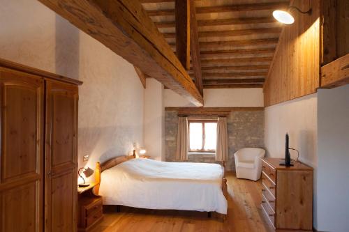 Ένα ή περισσότερα κρεβάτια σε δωμάτιο στο Agriturismo Sant'Egidio
