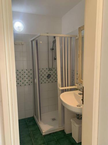 a bathroom with a shower and a sink at Casa Il Timone Indipendente in Ponza