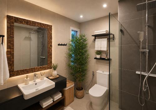 a bathroom with a sink and a toilet and a shower at SvoyLuX Primo 3BR Gated House Near Pier and Muay Thai Street in Phuket
