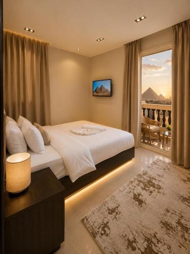 a bedroom with a large bed and a balcony at Crowne Pyramids View inn in Cairo