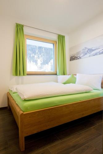 Postel nebo postele na pokoji v ubytování Alps 3000-2