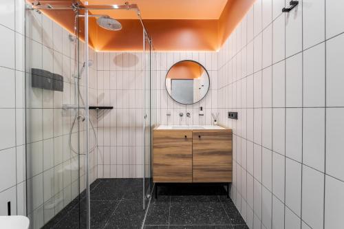 a bathroom with a sink and a mirror at Krasnyk Resort in Verkhovyna