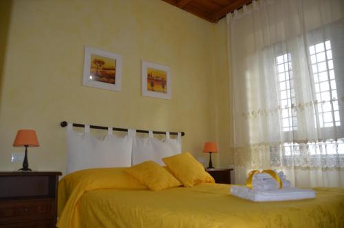 A bed or beds in a room at Casa Magini