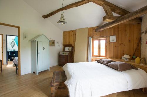 Katil atau katil-katil dalam bilik di Domaine TerrOcéane