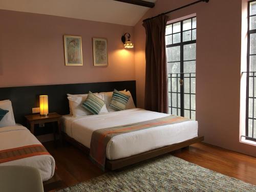 מיטה או מיטות בחדר ב-Spices Hotel