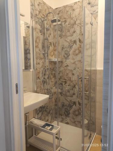 a bathroom with a shower and a sink at dante 55 in Agrigento