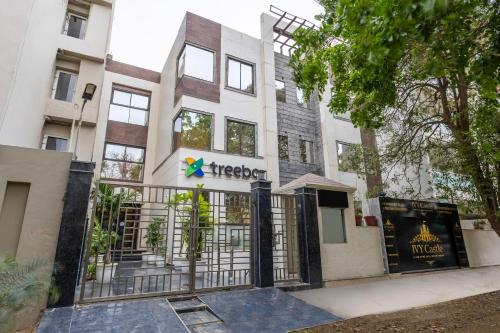 a building with a gate in front of it at Treebo Ivy Castle in Gurgaon