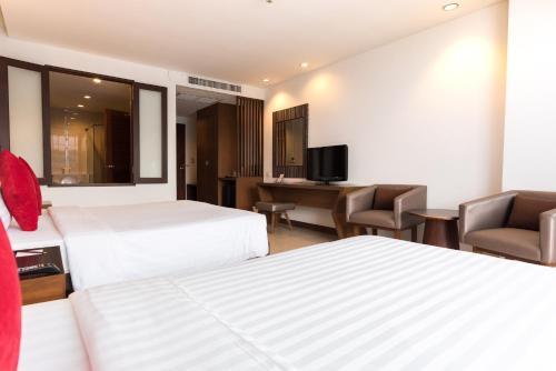 TV a/nebo společenská místnost v ubytování Hotel J Pattaya